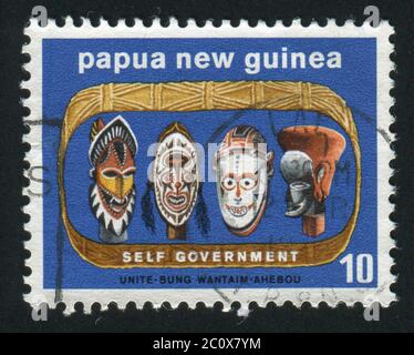 PAPUA NEW GUINEA - CIRCA 1973: Self-government. Masks, circa 1973. Stock Photo