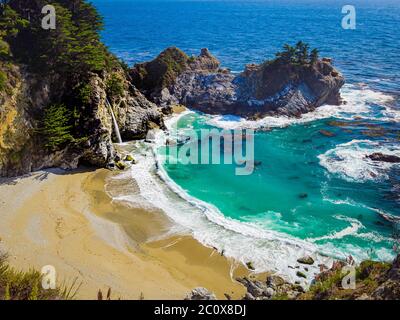 Aerial view of Water Fall McWay Falls Julia Pfeiffer Burns Park Big Sur California. McWay Falls a waterfall empties directly into the ocean. Stock Photo