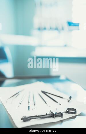 Dentist tools on the table in the office - treatment and prosthetics Stock Photo