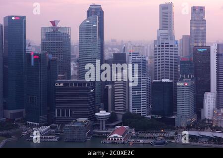 Aerial view of sunset over skyline of Singapore's downtown viewed from Marina Bay Sands Hotel's terrace. Singapore Stock Photo