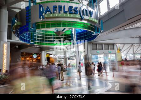 Raffles City. City Hall metro station. Singapore Stock Photo