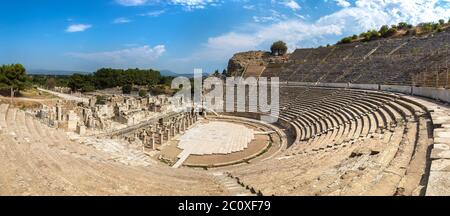 Panorama of Amphitheater (Coliseum) in ancient city Ephesus, Turkey in a beautiful summer day Stock Photo