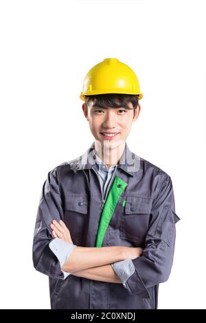 isolated young handsome asian technician on white background Stock Photo
