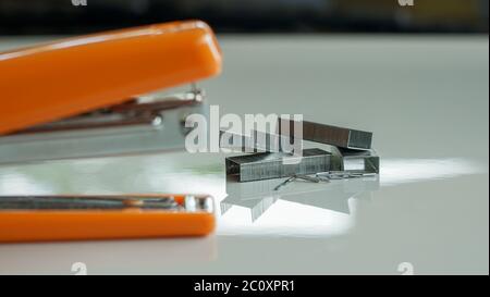 Close up the stapler on the table Stock Photo