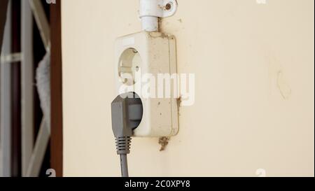 Close up the power jack on the wall Stock Photo