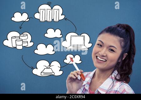 Composite image of smiling woman against wooden wall with notes on it Stock Photo