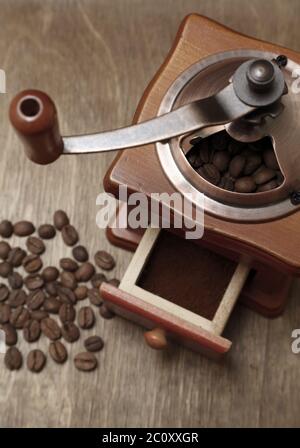 vintage coffee grinder and beans Stock Photo