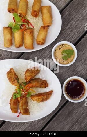 Chinese traditional spring rolls and gyoza or dumpling Stock Photo