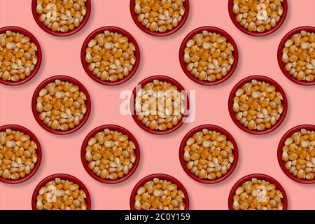 Bowl full of raw popcorn, seen from above, weft repetition Stock Photo