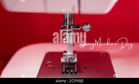 Close up photo of white sewing machine. Detail of the needle, plate, foot and transporter of an electric sewing machine. Photo with the text Sewing ma Stock Photo