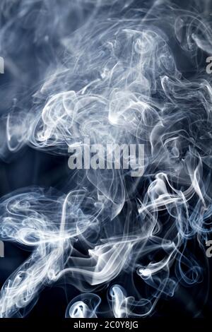 Beautiful smoke on the black background - macro photo Stock Photo