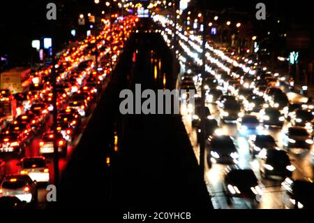 Out-of-focus lights from cars in a traffic jam Stock Photo