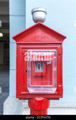 fire alarm against wall Stock Photo