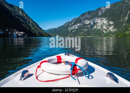 Boating on Lake Hallstatt with an Electric Motor Boat in a Beautiful Alpine Landscape, the Prow or Bow of a Rental Boat Stock Photo