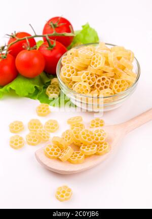 Raw pasta isolated on white background Stock Photo