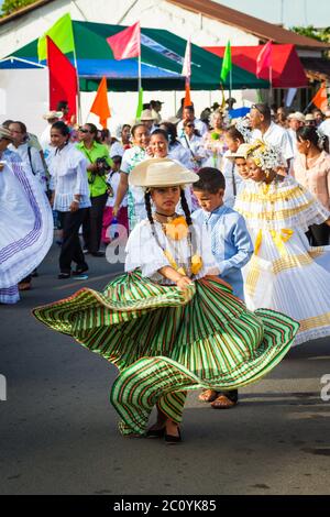 Girl dressed in pollera at the 'El Desfile de las Mil Polleras' (thousand polleras), Las Tablas, Los Santos province, Republic of Panama. Stock Photo