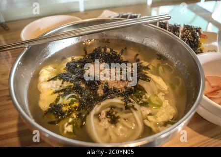 Traditional Korean spicy soup with dumplings and seaweed in Gyeongju South Korea Stock Photo