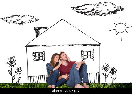 Composite image of young couple is sitting in front of house drawing Stock Photo