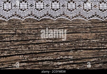 Openwork lace on wooden background Stock Photo