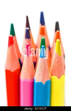 Colored pencils close up on white background, free space for text. Stock Photo