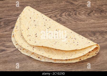 Mexican cuisine - Tortilla thick bread with cereal Stock Photo - Alamy