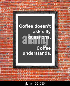 Coffee doesn't ask silly questions written in picture frame Stock Photo