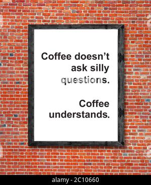 Coffee doesn't ask silly questions written in picture frame Stock Photo