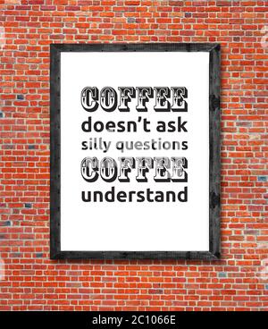 Coffee doesn't ask written in picture frame Stock Photo