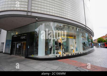 Exeter, Devon, UK.  13th June 2020.   Shops selling unessential items to reopen on Monday at Exeter in Devon as lockdown restrictions are eased further during the coronavirus pandemic.  View of the Next store on the High Street. Picture Credit: Graham Hunt/Alamy Live News Stock Photo