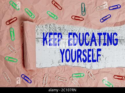 Text sign showing Keep Educating Yourself. Business photo showcasing dont stop studying Improve yourself using Courses Stock Photo