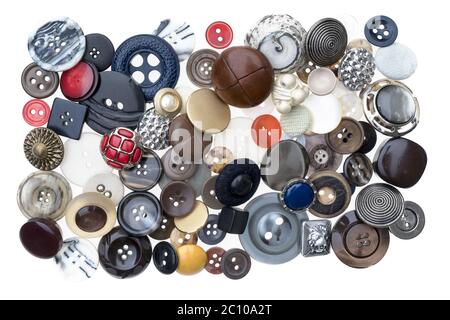 Lots of colorful buttons for clothes on wooden background Stock