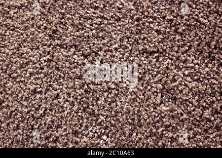 Fragment of material background brown carpet Stock Photo
