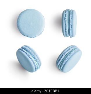 Set of blue french macarons isolated on white background. Top view. Stock Photo
