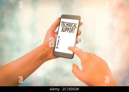 Writing note showing Technical Support. Business concept for a service provided by a hardware or software company Stock Photo