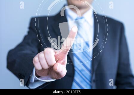 businessman touching virtual screen with cyber icon Stock Photo