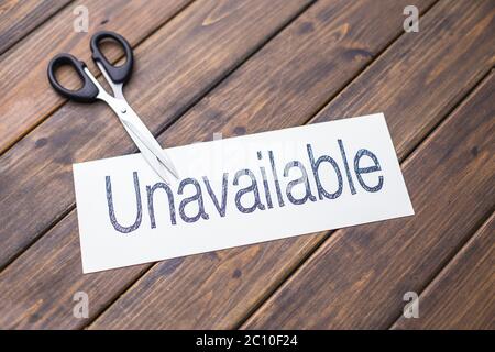 unavailable to available by scissors Stock Photo