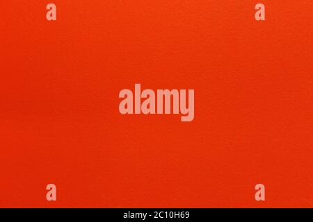 uniformly colored background orange paint Stock Photo