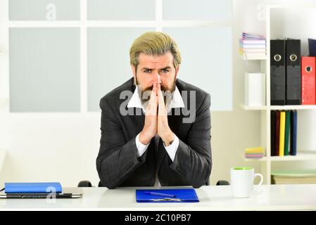 Legal services director. Man sit office. Business director. Bearded hipster creative director. Advocacy and jurisprudence. Case manager track paperwork and other important information about case. Stock Photo