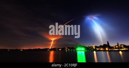 Melbourne Beach, Florida, USA. June 13, 2020. SpaceX launched its ninth Starlink mission, which will included 58 Starlink satellites and three of Planet's SkySats. Falcon 9 will lifted off from Space Launch Complex 40 (SLC-40) Cape Canaveral Space Port Station at 05.21a.m. lighting up the pre-dawn sky. Photo Credit: Julian Leek/Alamy Live News Stock Photo