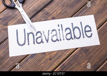 unavailable to available by scissors Stock Photo