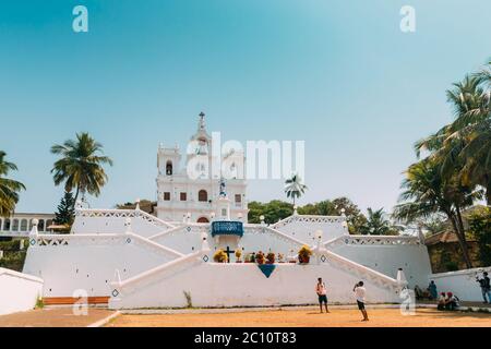 Panaji, Goa, India. People Walking Near Our Lady Of The Immaculate Conception Church Is Located In Panjim. Famous Landmark And Historical Heritage Stock Photo