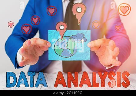 Writing note showing Data Analysis. Business concept for Business intelligence and analytics with a new startup project discussion Stock Photo