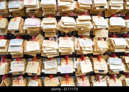 wood plates with good wish hanging in temple in tokyo Stock Photo