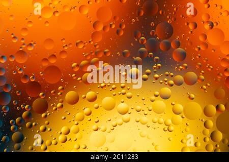 Close-up water and oil abstract in a rainbow lighting effect Stock Photo