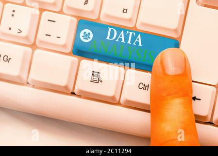 Writing note showing Data Analysis. Business concept for Business intelligence and analytics with a new startup project discussion Stock Photo