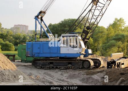 heavy crawler crane at the construction site for the  of road transport interchanges in Moscow Stock Photo