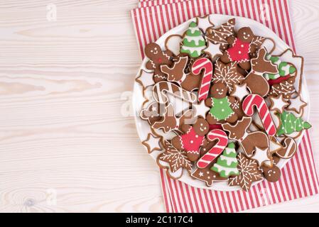 Christmas gingerbread cookies on a white plate, top view with copy space Stock Photo
