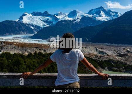 Indian tourist enjoying view over Glacier Exploradores in Chile Stock Photo