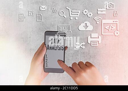 Writing note showing Data Analysis. Business concept for Business intelligence and analytics with a new startup project discussion Stock Photo