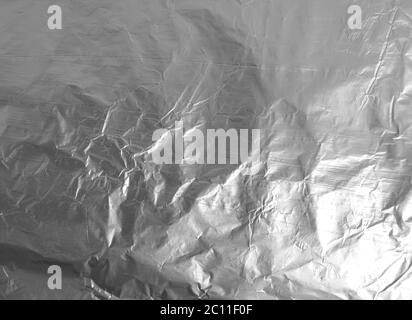 Color texture of creased kitchen aluminum foil Stock Photo